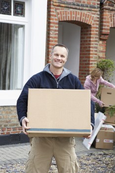 Small removals van loading household items in Belvedere