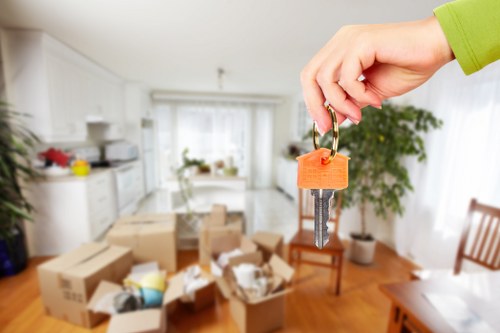 Professional movers handling furniture during a Belvedere house move